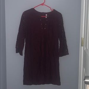 maroon lace dress with cross cross and tassels